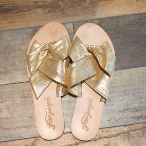 Free People Gold Sandals with Metallic Bow T-Strap